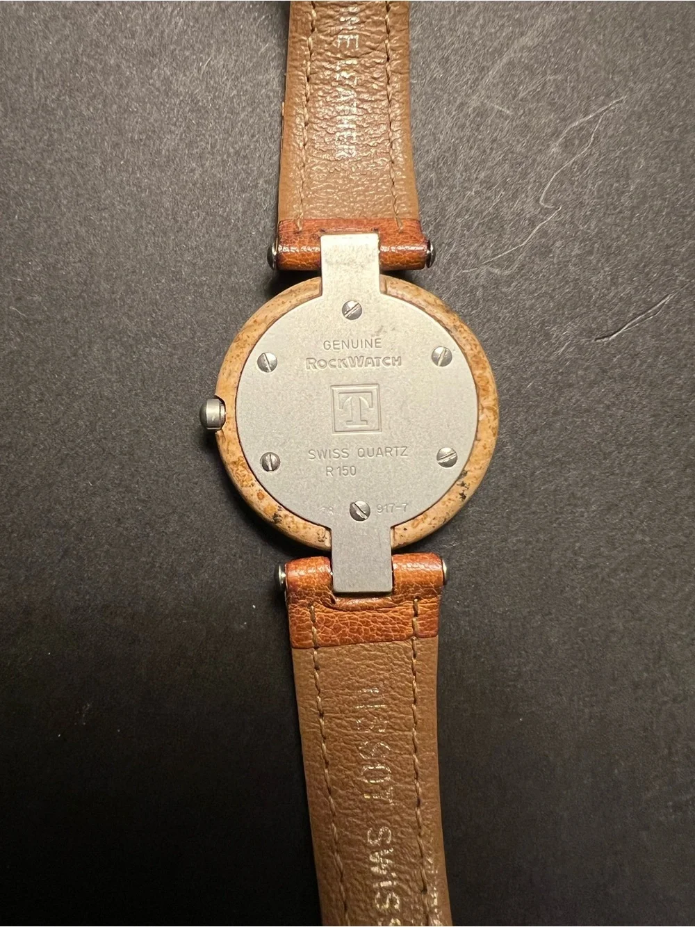 Tissot Beige Round Rock Watch with Red and Yellow Hands